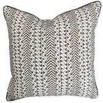The Luxor Coco Oyster Pillow is a custom-made square decorative pillow with a brown and white geometric chevron and wavy line pattern, crafted from the finest materials.