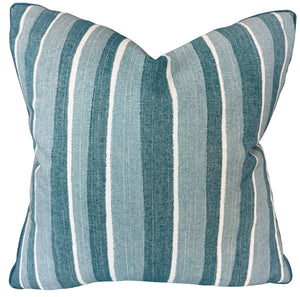 The Orchard Stripe Pillow is a square throw pillow with vertical teal, white, and light blue stripes on textured fabric, custom-made from premium materials for enhanced comfort and style.