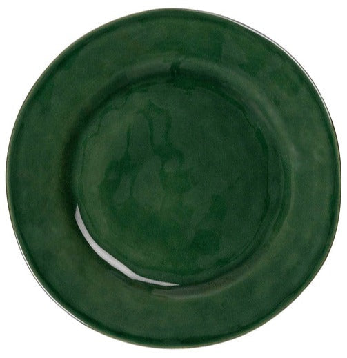 An empty Juliska Puro Basil Collection ceramic dinnerware set plate viewed from above.