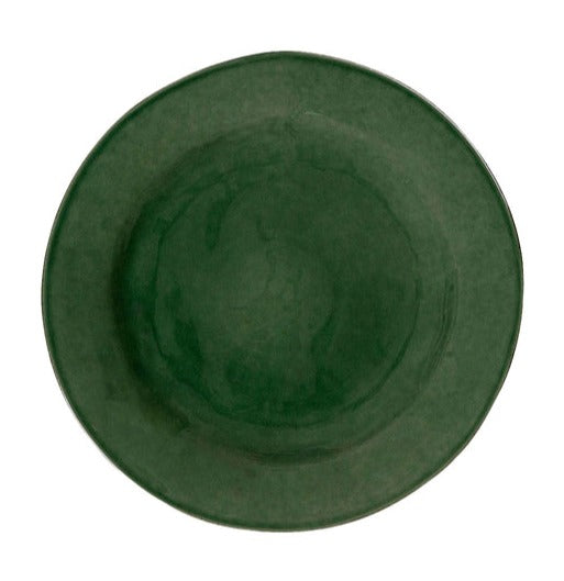 A green felt hat with a circular brim viewed from above resembles a Juliska Puro Basil Collection table setting.