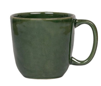 Green ceramic mug from the Juliska Puro Basil Collection isolated on a white background.