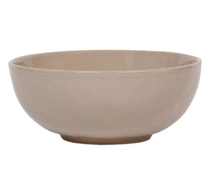 A simple Juliska Puro Taupe Collection ceramic bowl on a plain background.