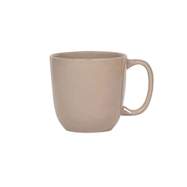 A Juliska Puro Taupe Collection ceramic mug isolated on a white background.