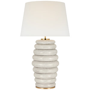 Part of the Phoebe lighting collection, the Phoebe Extra Large Stacked Table Lamp, Antiqued White features a white, stacked ring base and a white drum shade, effortlessly blending contemporary and vintage aesthetics inspired by Kelly Wearstler.