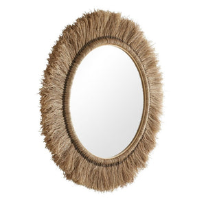 The Kai Mirror in Natural, 41"Dia, features a round design with a natural abaca fiber frame for a textured, organic look inspired by handcrafted artisan styles.