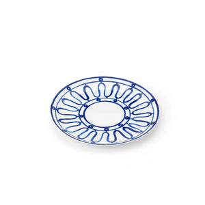 A round white plate from the Themis Z Kyma Blue Collection, featuring a harmonious blue geometric pattern inspired by the Greek Aegean Sea, displayed on a plain white background.
