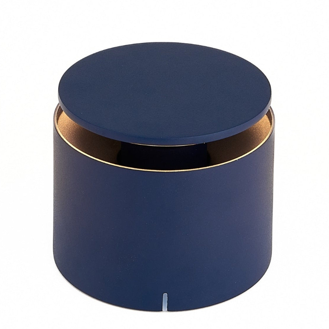 The Zafferano PushUp Pro Lamp Collection features a round, matte blue rechargeable table lamp with a matching lid and a slim gold rim near the top, displayed on a white background.