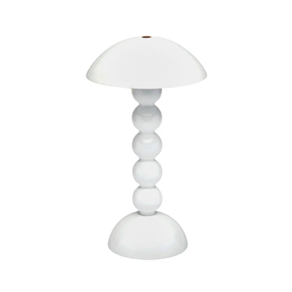 The Addison Ross Bobbin LED Cordless Lamp features a modern white dome shade and four stacked spheres on a rounded base—ideal for bringing stylish lighting to sideboards or alfresco dining tables.
