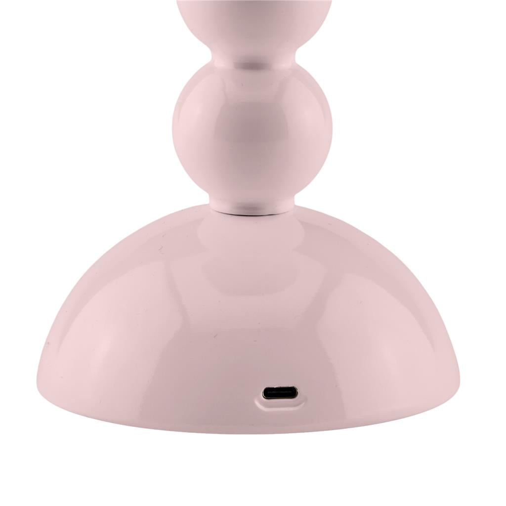Close-up of the base of the Addison Ross Bobbin LED Cordless Lamp, a pink, bobbin-shaped portable light featuring a visible USB-C charging port.
