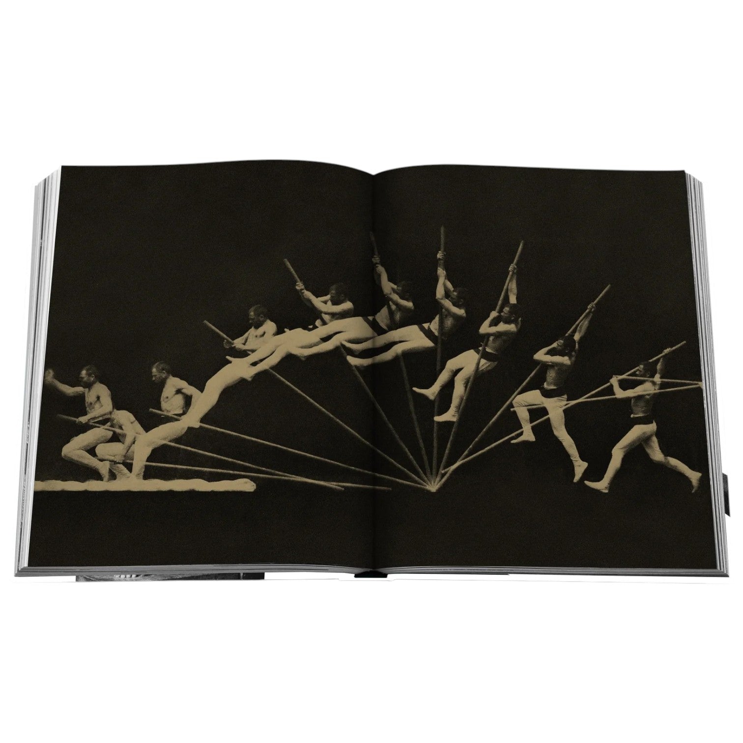 An open copy of "The Last Heroes: 100 MOMENTS OF OLYMPICS LEGEND" displays a sequence of photographs depicting a man with a rifle captured mid-jump against a dark background, echoing the energy of the Summer Olympics.