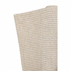 A close-up of the Lina Strie Rug, a rolled-up beige handwoven piece with a textured pattern, perfect for indoor or outdoor use, set against a plain white background.