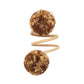 The Kim Seybert Casbah Napkin Ring features a coiled sisal rope with brown and cream bristle pom-poms at each end, offering organic elegance, shown against a white background.