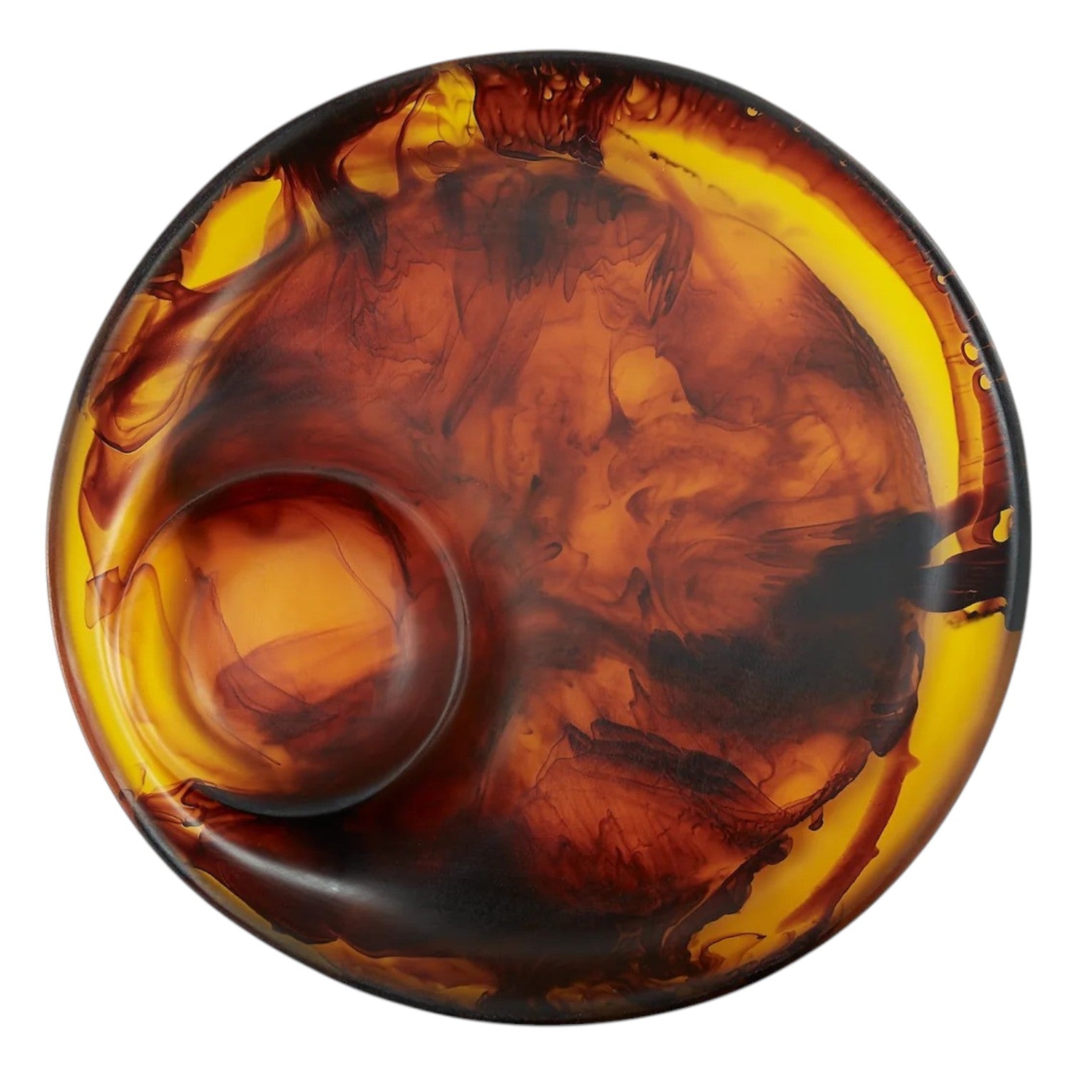 Part of the Tortoise Resin Serveware Collection, this round plate features a deep brown and amber swirl pattern, a small circular indentation, and offers both artistic flair and functional design.