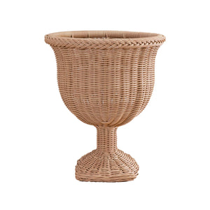 The Outdoor Braided Urn is a large, goblet-shaped basket with a wide opening and pedestal base, crafted from all-weather rattan—perfect for any outdoor collection—shown against a plain white background.