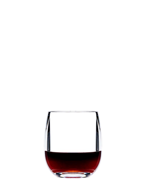 A crystal-clear stemless wine tumbler from the Bold Oasis Acrylic Collection, featuring sleek, modern curves, is filled halfway with red wine against a plain white background.