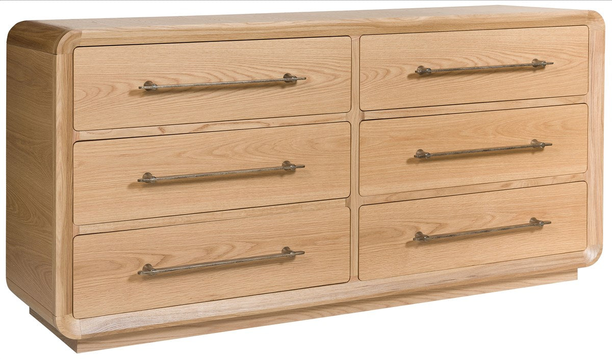 The Form Dresser features a timeless wooden design with a light finish and six spacious drawers in two rows, each accented by sleek metal handles.
