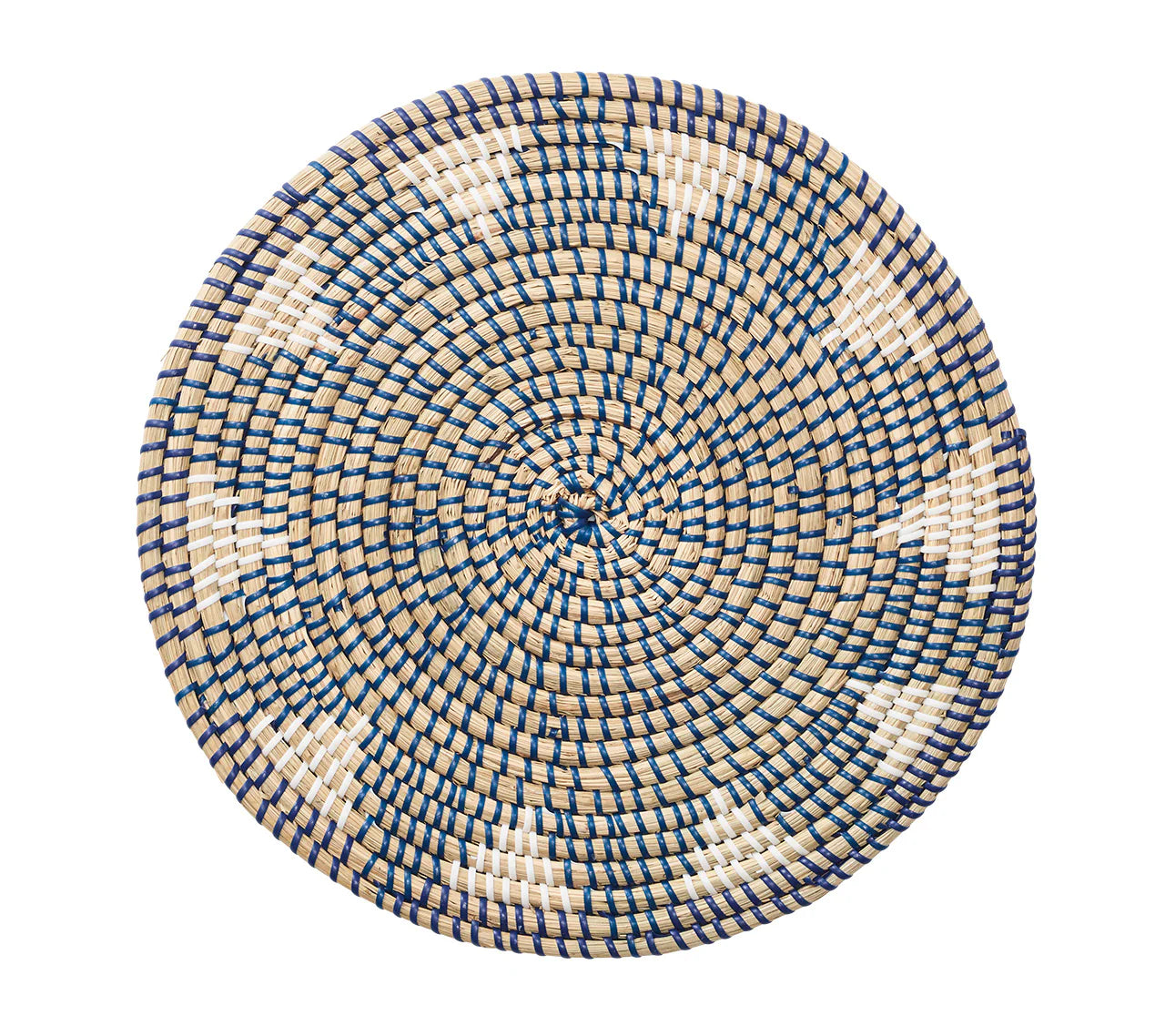 A round woven basket lid featuring a geometric pattern in natural, navy blue, and white seagrass—reminiscent of the Kim Seybert Majorelle Placemat Collection—viewed from above on a white background.
