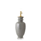 The Marathon Table Lamp in Fossil Grey features a glossy hand-thrown ceramic base, a gold-finished socket, and a clear round acrylic base, displayed against a white background.