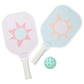 The SUNNYLiFE Pickleball Set in Rio Sun Multi features two pastel paddle rackets with sun designs and a perforated mint-green ball, all crafted with a durable polymer honeycomb core for high performance, arranged on a white background.