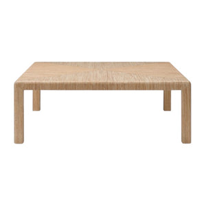 The Parson Coffee Table in Natural Hemp is a rectangular, light wood coffee table with four straight legs and a front-facing subtle woven hemp triangle pattern.