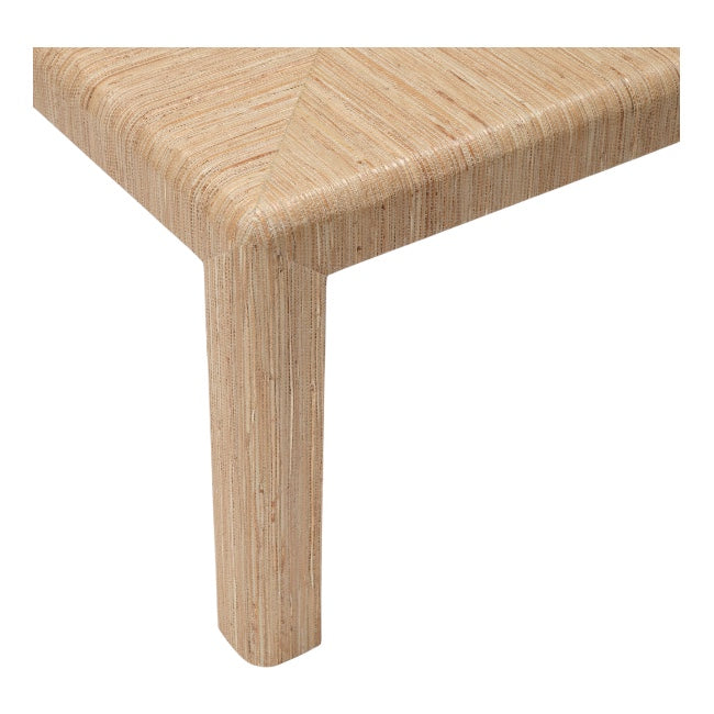 Close-up of the Parson Coffee Table in Natural Hemp, featuring a striped veneer with a subtle triangle pattern, showing one leg and part of the tabletop against a white background.