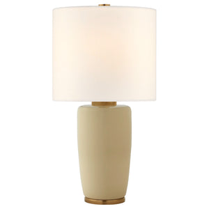 The Chado Large Table Lamp features a beige ceramic base, cylindrical white fabric shade, and elegant gold accents, making it an ideal addition to refined home décor.