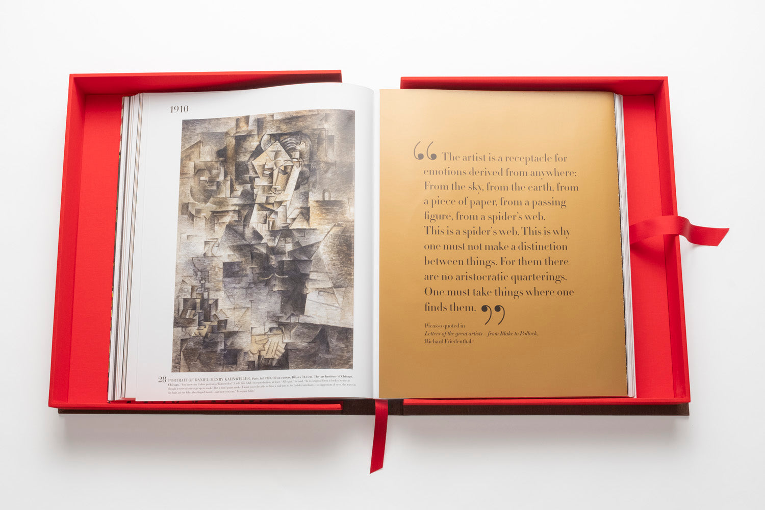 Open book in a red box showing a page with abstract artwork on the left and a quotation in white text on a golden background on the right, from The Impossible Collection: Picasso, celebrating influential artists of the twentieth century.