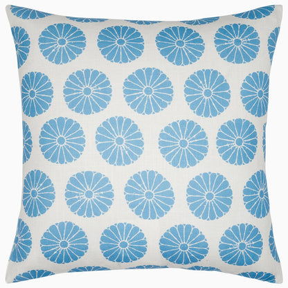 The John Robshaw Aleesa Outdoor Pillow showcases blue floral patterns on a white background and is engineered to be sun- and rain-resistant.