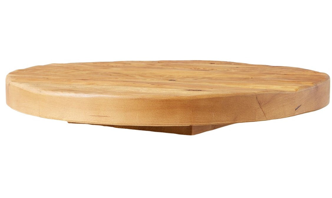 The Classic Trivet Top Lazy Susan, a meticulously polished handcrafted circular wooden slab, showcases its unique wood grain patterns while doubling as a revolving server for added functionality.