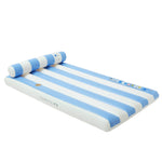 The SUNNYLiFE Luxe Lilo Blue Stripe is an inflatable pool lounger with blue and white stripes, inspired by Australia’s summer style. It features a built-in pillow and safety warning labels on the side.