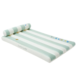 The SUNNYLiFE Luxe Lilo Green Stripe is a rectangular inflatable pool lounger with white and light green stripes, a built-in headrest, and the brand logo—ideal for relaxing in Australia’s summer style.