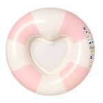 The SUNNYLiFE Luxe Poolside Tube Float Pink Stripe features alternating pink and white sections with a heart-shaped mesh center and warning labels—ideal for relaxing on Sydney beaches and enjoying Australia’s summer style.