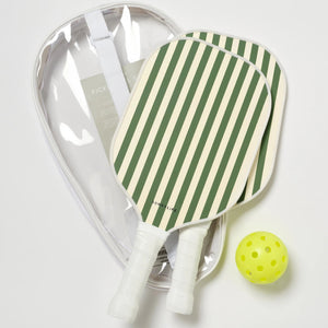 The SUNNYLiFE Pickle Ball Set in Olive includes two green and white striped paddles with foam handles, a yellow perforated ball, and a clear zippered carrying case, all displayed on a white background.