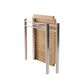 The Sundeck Folding Table features a metal frame with four cylindrical legs and a rectangular perforated wood panel, shown upright on a white background.