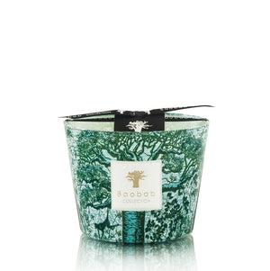 A Baobab Collection Sacred Trees Kamalo Candle in a green and white patterned glass jar, topped with a black ribbon bearing the brand name.