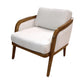 The Schooner Lounge Chair in Outdoor Ivory Chenille features a modern wooden frame and light upholstered seat, angled for style—perfect for coastal living and bringing a touch of luxury to your space.