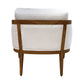 The Schooner Lounge Chair in Outdoor Ivory Chenille features a light wood frame and white upholstered panels, viewed from the back against a white background, embodying the relaxed elegance of coastal living.