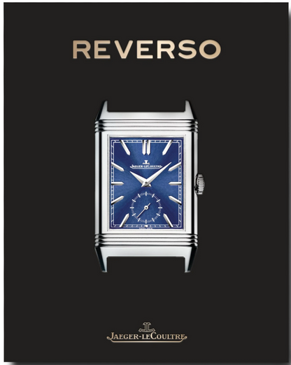 A Jaeger-LeCoultre: Reverso wristwatch with an Art Deco blue dial displayed on a black background. The words "REVERSO" and "Jaeger-LeCoultre" appear above and below the watch, respectively.