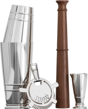 A Fortessa Crafthouse Shaker Set featuring a stainless steel cocktail shaker, strainer, wooden muddler, and jigger, perfect for crafting cocktails with precision.