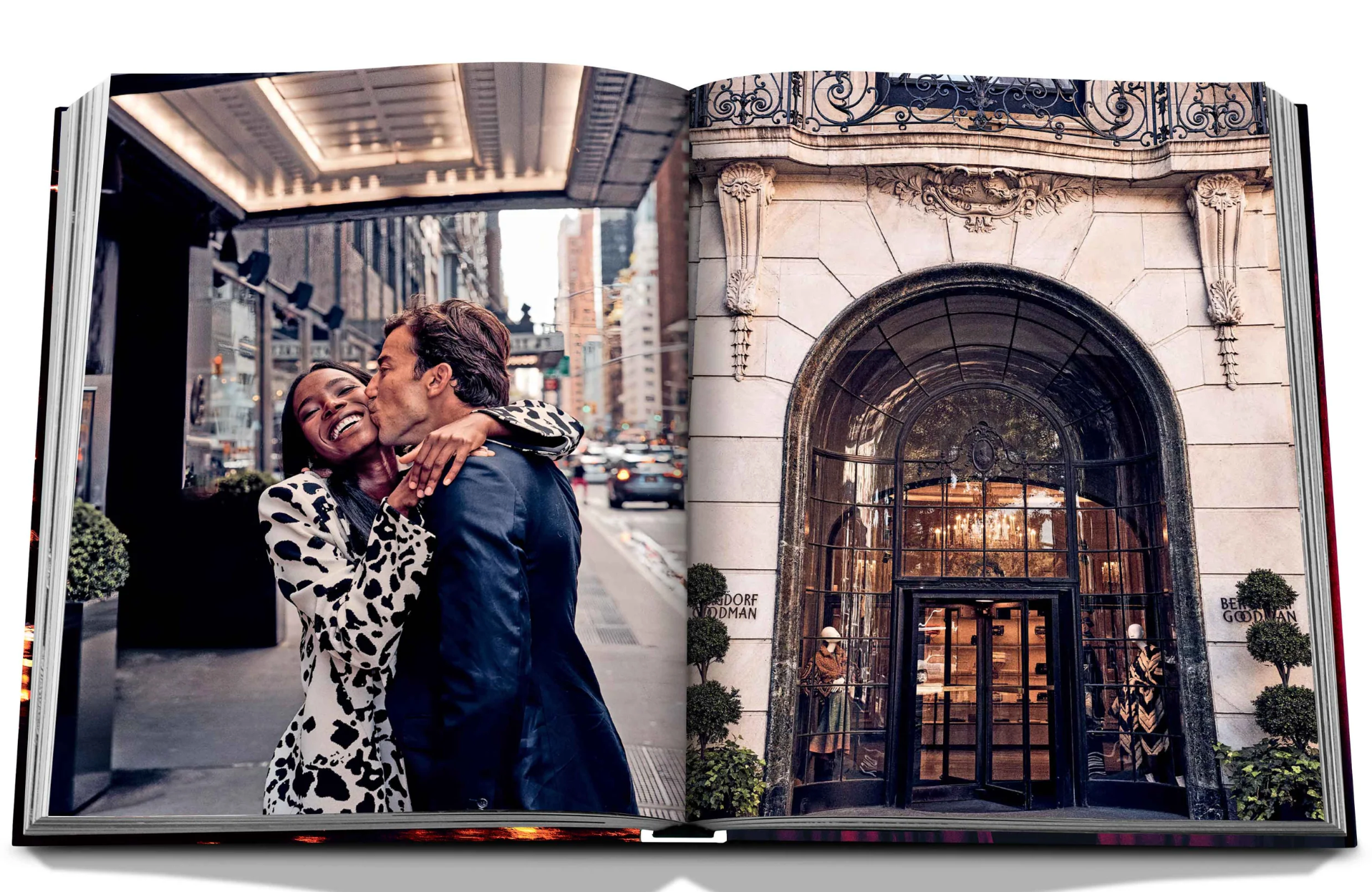 A man kissing a woman in an elegant Assouline New York Chic photo album.