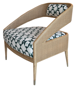 The Tenan Lounge Chair in Broadway features a modern wooden armchair with a rattan frame, showcasing a geometric patterned seat and backrest with an open, angular design and elegant Blonde Brass finish.