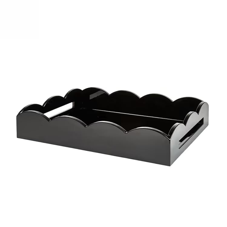 The Scalloped Lacquer Tray in Black, featuring scalloped edges and side handles, is ideal as a drinks tray and is displayed on a white background.