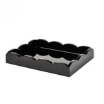 The Scalloped Lacquer Tray in Black features scalloped edges and a glossy finish, making it a stylish drinks tray. Shown on a plain white background.