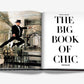 An open book with the left page showcasing a man in a tuxedo and top hat jumping, and the right page displaying the title "The Big Book of Chic" by Miles Redd, a noted figure in eclectic design, published by Assouline.