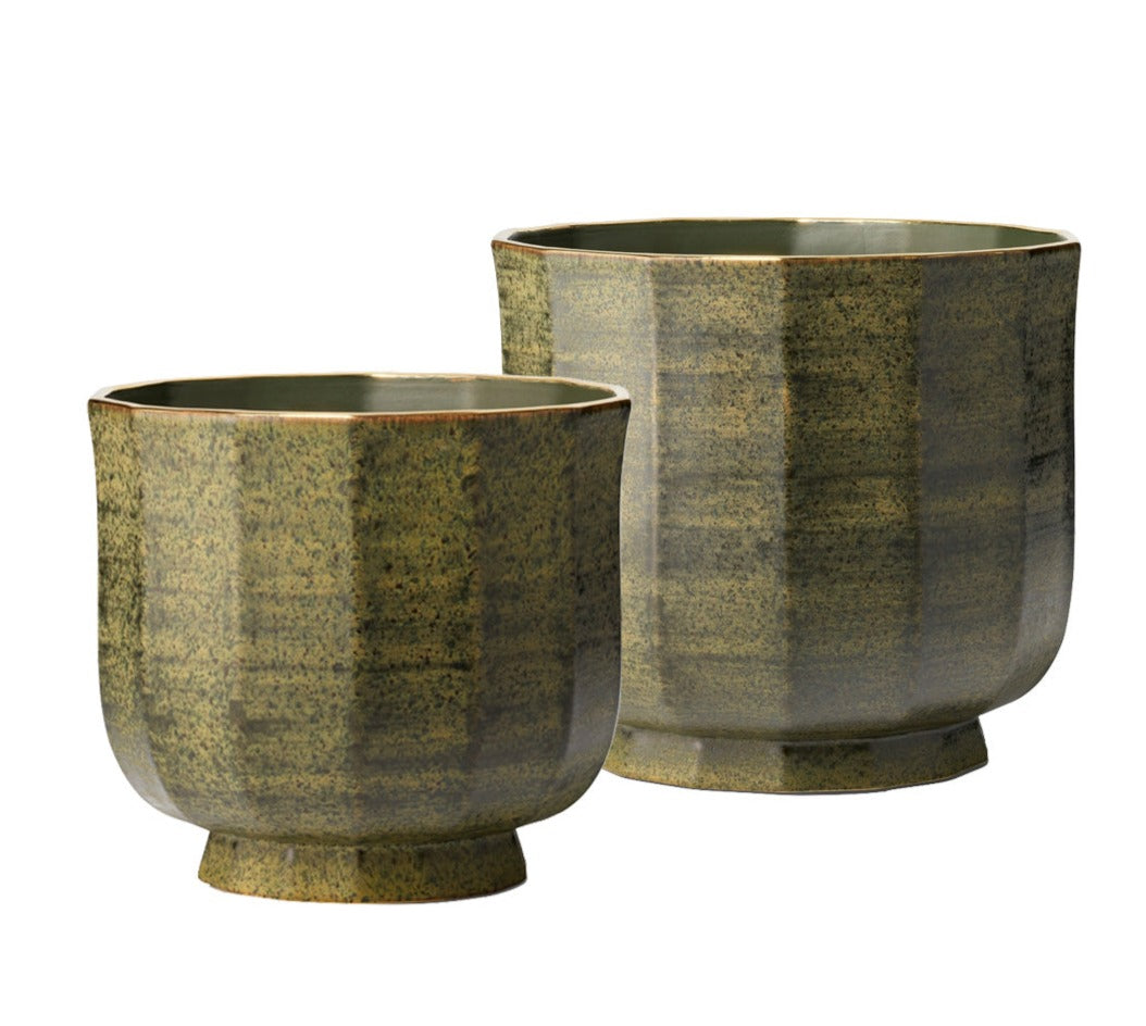 Two green ceramic cachepots from the AERIN Delmara Cedar Cachepot Collection, one larger and one smaller, both featuring a slightly flared rim and a short, sturdy base. The hand-applied glaze adds an artisanal touch to these elegant pieces.