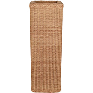 The Outdoor Braided Pedestal is a tall, rectangular basket with a woven pattern and open top, crafted from all-weather wicker and shown from the front against a white background.