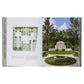 An open book, "The Young Man and The Tree: Fernando Wong Landscape Design," shows a garden layout on the left page and, on the right, a photo of a formal garden featuring a fountain, benches, and lush greenery inspired by Wong’s designs.