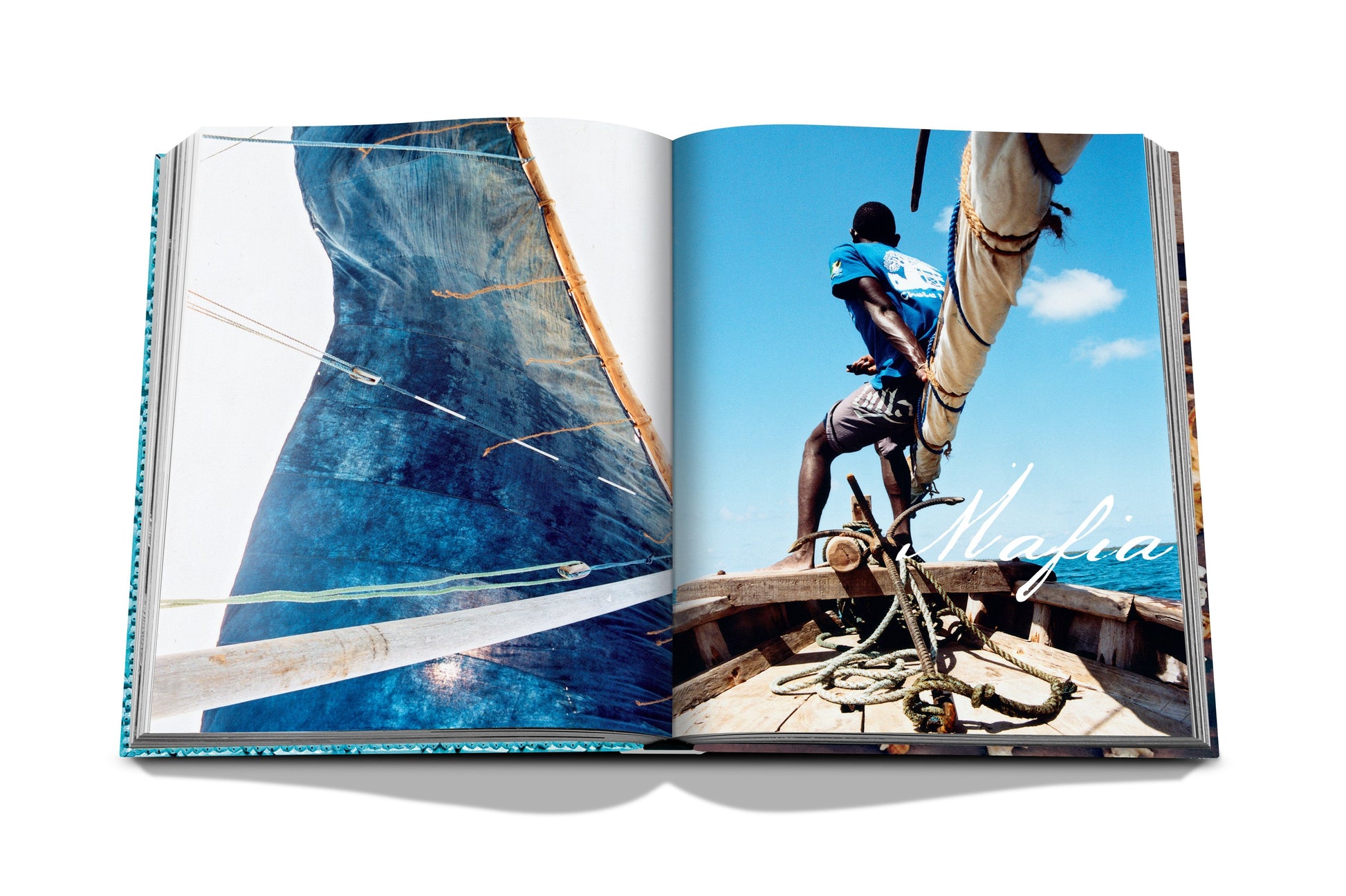 An open book reveals a man in a blue shirt sitting on a wooden boat with ropes, under a bright blue sky. The word "Zanzibar" is visible on the right page, hinting at tales of Zanzibar and Stonetown.