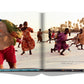 An open Zanzibar reveals a photo of children running on a beach in Zanzibar, with palm trees swaying in the background. Below the photo, an incomplete quote hints at the joy and tradition of Swahili rituals.