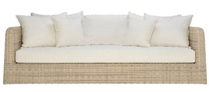 The Zeya Outdoor 3 Seater Sofa features weather-resistant wicker, a light beige cushion, and five matching throw pillows, shown from the front against a white background—perfect for your outdoor sanctuary.